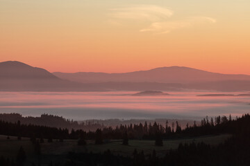 a beautiful landscape with the Carpathian mountains seen from above in the morning