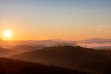 A beautiful landscape with sunrise over the mountains