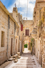 Traditional houses and churches decorated with the famous geometric scratch patterns in the medieval mastic village of Pyrgi on the island of Chios, Greece