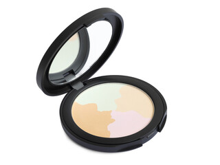 Four color compact pressed powder in black round container with mirror, isolated on white