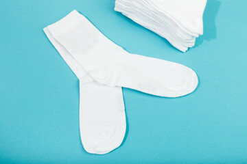  white socks on blue  background .