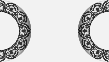 Postcard design in white with black mandala patterns. Vector invitation card with place for your text and ornament.