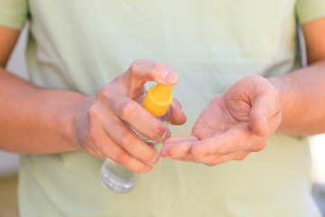 hand disinfection with an antiseptic spray as prevention of coronavirus - Image