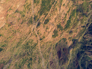 Drop down view of spectacular volcanic landscape with magma layers.