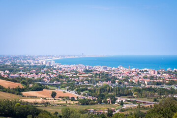 Fototapeta na wymiar The towns of Cattolica and Riccione with the Adriatic Sea views from Gradara Castle in Marche, Italy