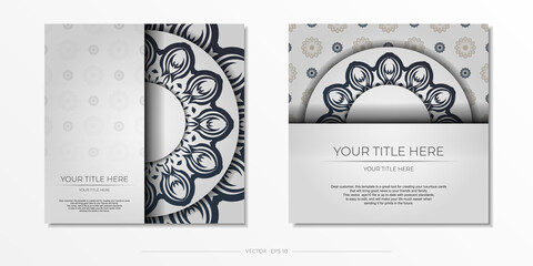 Stylish Postcard Design White with dark blue vintage patterns. Stylish invitation with Greek ornament.