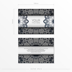 Stylish vector design for postcard in White color with dark blue vintage patterns. Stylish invitation card with Greek ornament.
