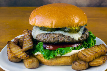 turkey burgertop with swiss cheese and pickles