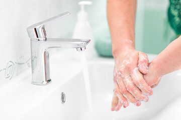 thorough hand washing with soap and water to prevent coronavirus - Image