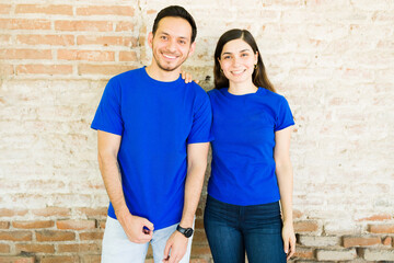 Portrait of a woman and man with mock-up t-shirts