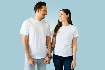 Holding hands while wearing fashion t-shirts