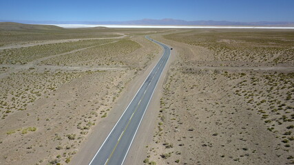 route in desert on high plain shot with drone