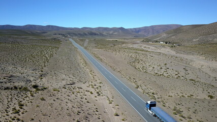 Fototapeta na wymiar route in desert on high plain shot with drone