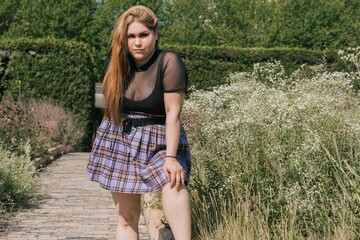 Trendy plus size woman in mini skirt