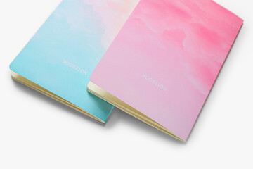 Stylish notebooks on white background, closeup