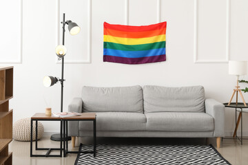 Modern interior of stylish living room with flag of LGBT