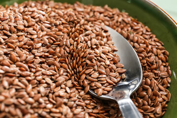 Bowl with flax seeds, closeup