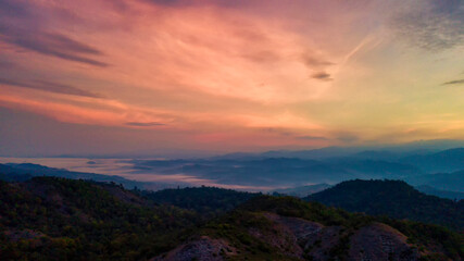 Fototapeta na wymiar Top view Mountainous landscape in autumn at sunset.