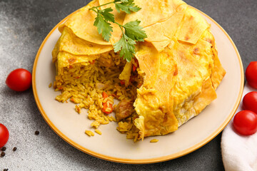 Plate with tasty Shah Pilaf on black and white background