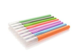 Different colorful markers on white background