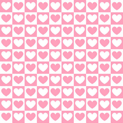 Vector seamless pattern of pink colored chess board checkered texture and hearts isolated on white background