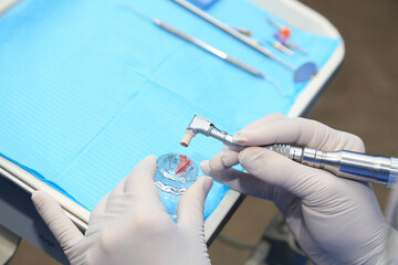 Placing prophylactic paste. Dental cleaning concept.