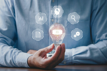 Men holding light bulbs, ideas of new ideas with innovative technology and creativity. innovative new concepts in the most advanced AI (artificial intelligence) technology