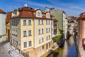Fototapeta na wymiar Historic houses at the Certovka canal in Prague, Czech Republic