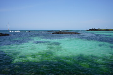 a beautiful seascape with clear bluish water