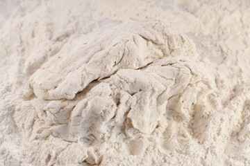 Wheat dough in the kitchen close