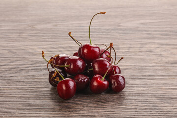 Ripe sweet cherry berries heap