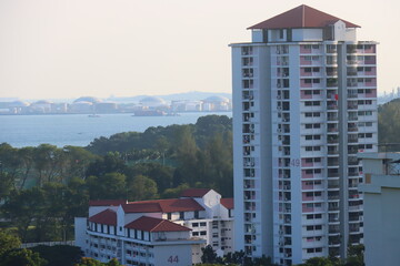 Fototapeta premium HDB public housing - apartments overlooking the sea in Singapore, Asia.