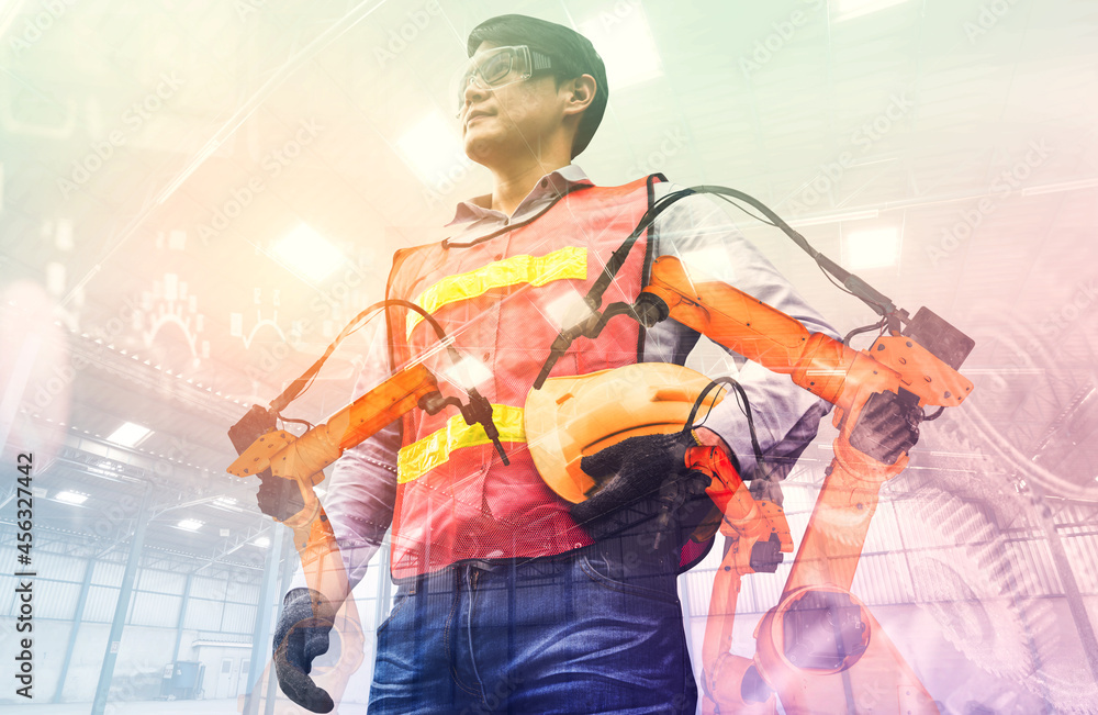 Poster mechanized industry robot arm and factory worker double exposure . concept of robotics technology fo