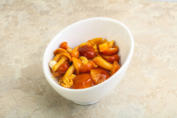 Marinated pickled honey mushrooms in the bowl