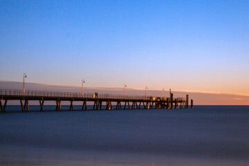 Fototapeta na wymiar Glenelg Pier at Sunset