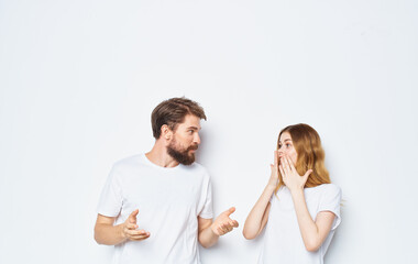 fashionable young couple in white t-shirts and jeans mockup design