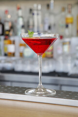 Cosmopolitan cocktail on bar counter