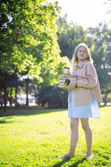 beautiful schoolgirl with a backpack