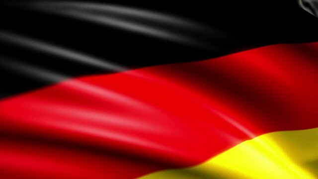 close up view of the deutsch germany flag waving in the wind.
