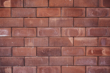 Background texture of brownish orange brick wall.
