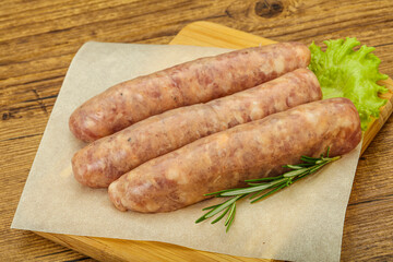 Raw pork meat sausages for grill