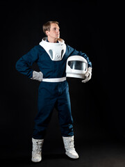 An astronaut in a spacesuit is ready for launch.