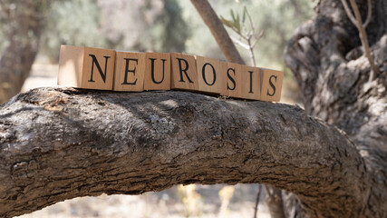 The word neurosis was created from wooden blocks. Sociology and life.