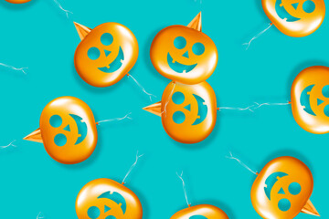 Halloween background made of orange pumpkins in a spiral on a teal background, Halloween concept
