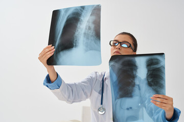 woman sitting at table x-ray treatment professional