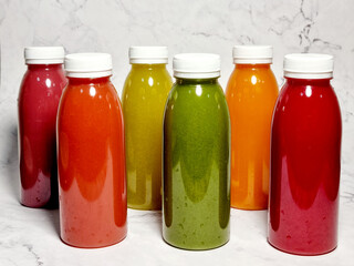 Cold pressed juice in a plastic bottle.