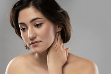 Fototapeta premium Portrait of young beautiful brunette woman
