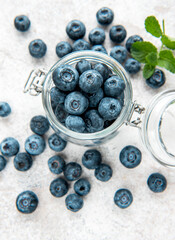 Blueberries on concrete background