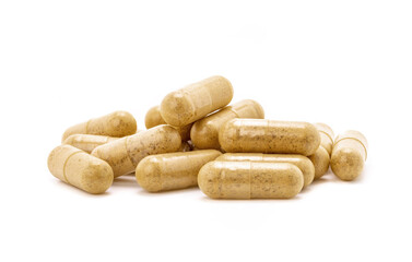 Group of brown herbal supplement capsules for health