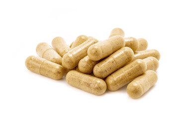 Fototapeta na wymiar Group of brown herbal supplement capsules for health